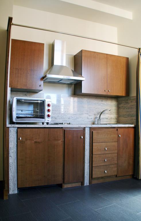 I Cento Campanili Apartment Ачиреале Стая снимка
